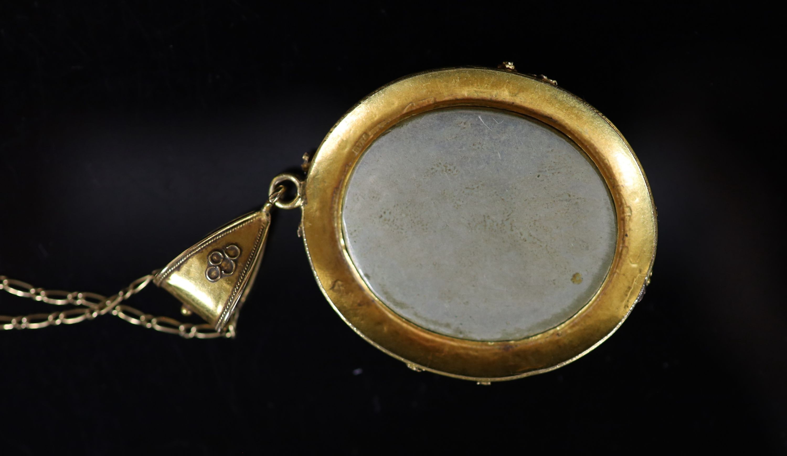 A 19th century gold and micro mosaic set oval pendant, decorated with Doves of Peace